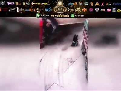 TWO MEN BEING CRUSHED BY TRUCK