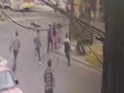 TRAFFIC GUARD IS RUN OVER BY MOTORCICLE