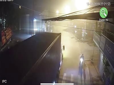 MOTORCYCLIST BEING RUN OVER BY TRUCK