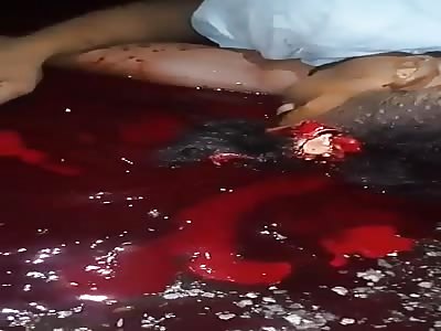 HEAD BLOWN OFF AND BLOOD PUDDLE