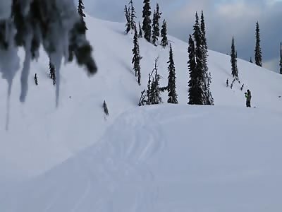 SNOWMOBILE RIDER SLIPS DURING STUNT
