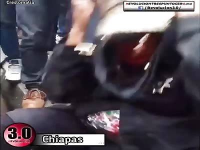 POLICE CAUGHT STEALING IS BEATEN BY MOB