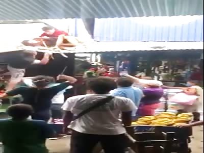 THIEF THROWN FROM THE ROOF AND BEATEN WITH MACHETE
