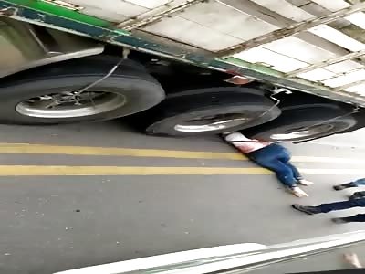 SHE WAS RUNOVER BY TRUCK 