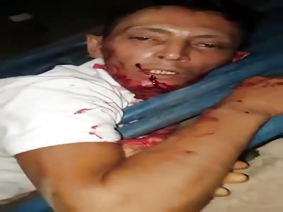 Man is Fully Awake with a Throat Slit