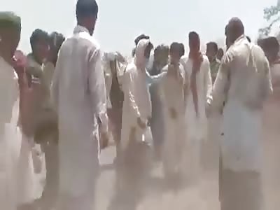 HE'S BEATEN BY GROUP OF MEN WEARING DRESSES