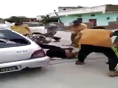 MAN BEING BEATEN 