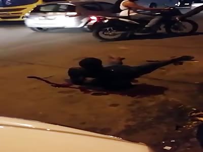 MAN BLEEDING IN THE STREET