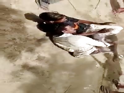 GROUP OF MEN BEATEN WITH STICKS AND KICKS