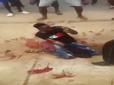 AFRICAN BEATING TO DEATH