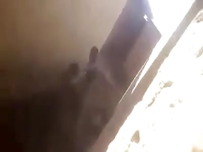 AFRICAN MAN STONING WIFE