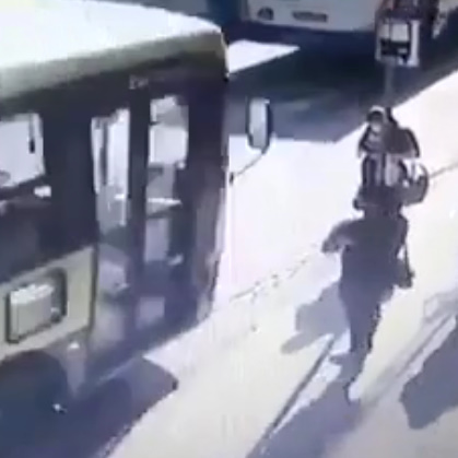 STUPID DRIVER AND A WOMAN WITH CELL PHONE