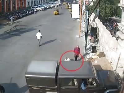 Jeep runs over beggar sitting in Street.