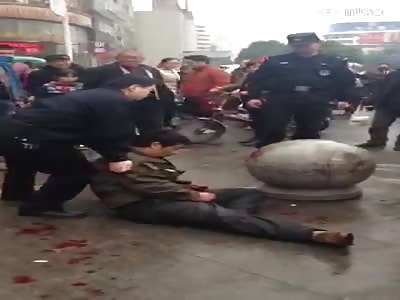 Man stabs himself in belly at train Station.