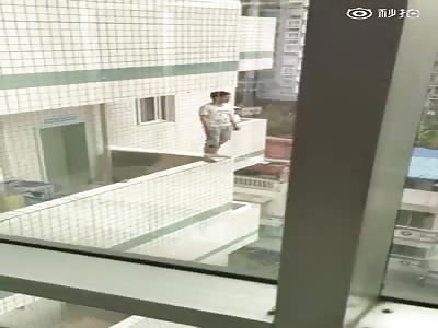 Man jumps off building. 
