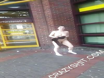 Germany; Woman on drugs, dancing.