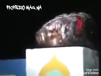 Beheaded man lying on the street