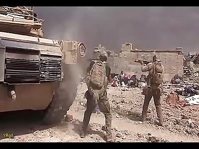 Graphic: Western Volunteers Rescue Little Girl Hiding Among Dead Civilians