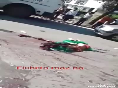 Woman totally crushed by truck