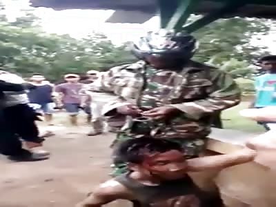 Thief beaten, police try to save him