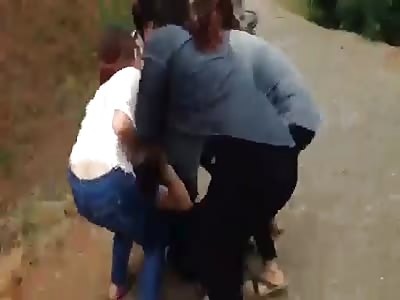 Chinese fighting and trying to take off clothing to another china