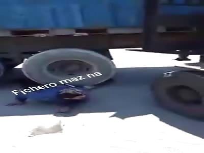 Man Crushed under Truck still Conscious and Alive