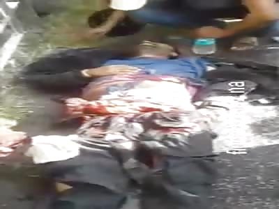 man agonizes with guts outside