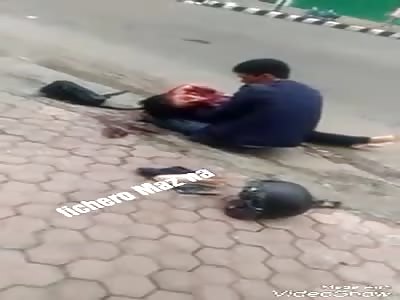 Barefoot Girl Appears to Die After Motorcycle Accident with Truck in Indonesia