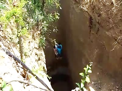 MEN ARE TAKEN OUT OF THE EXCAVATION AND BREAK ROPE