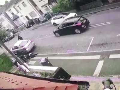 Thug with Machete is Mowed down by Speeding Car as Gang Chases Man down Road