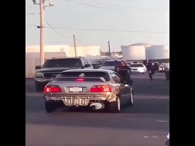 AUTO ROLLS A MAN THAT RUNS BEHIND A CAR