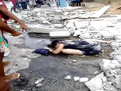 WOMAN DIES CRUSHED BY WALL