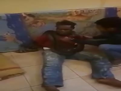 TORTURED THIEF WITH SNAKE