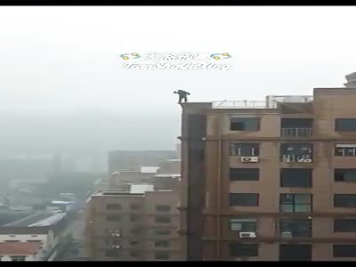 MAN FALLS OF BUILDING (includes aftermath).