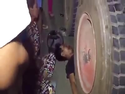 WOMAN CRIES HER DEAD HUSBAND