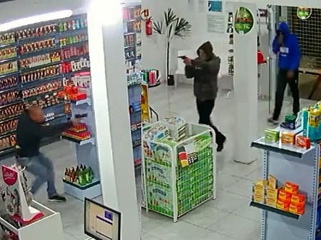 Quick Acting Cop Goes Wild West on Two Robbers