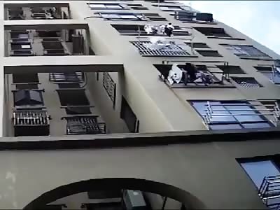 Installer and Air Conditioner Falls to the Ground