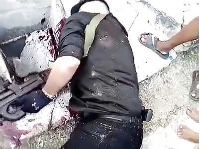 Still Gripping the Machine Gun