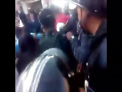 TWO WOMEN BEATED BY THE CROWD