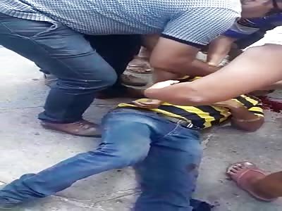 MAN AGONIZES ON THE FLOOR