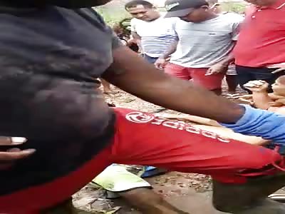 WOMAN CRIES HER DEAD HUSBAND