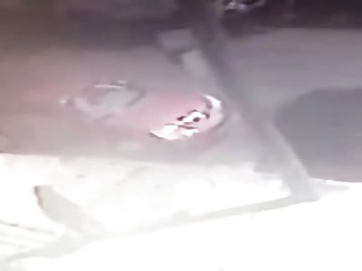 Man stealthily walks and executes man