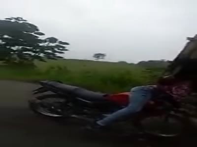 Shit, biker is under the truck