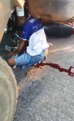 Poor Bastard Still Alive after Crushed by Truck