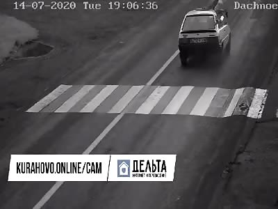 Car runs over pedestrian