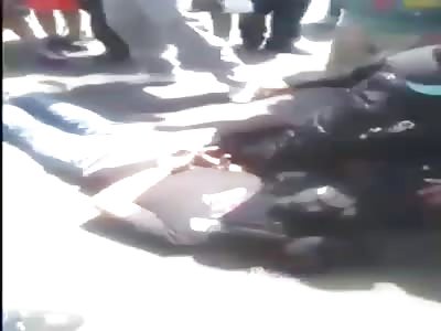 Thief hit by enraged people