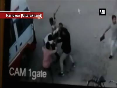 bandits beaten man with sticks 