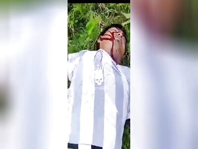 They find a dead man with gunshot  on the side of the road