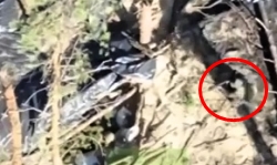 A UA soldier in a trench is killed by an ORC