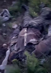 UA soldier shows a captured ORC position with trash and KIA